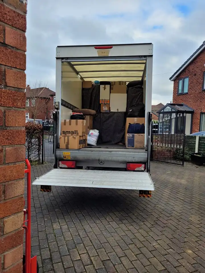 mepro removals van filled with items